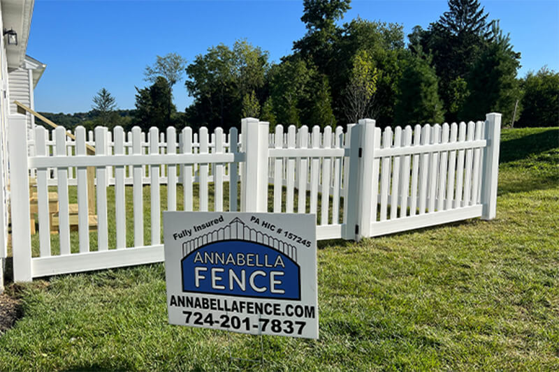 White picket fence installed by Annabella Fence